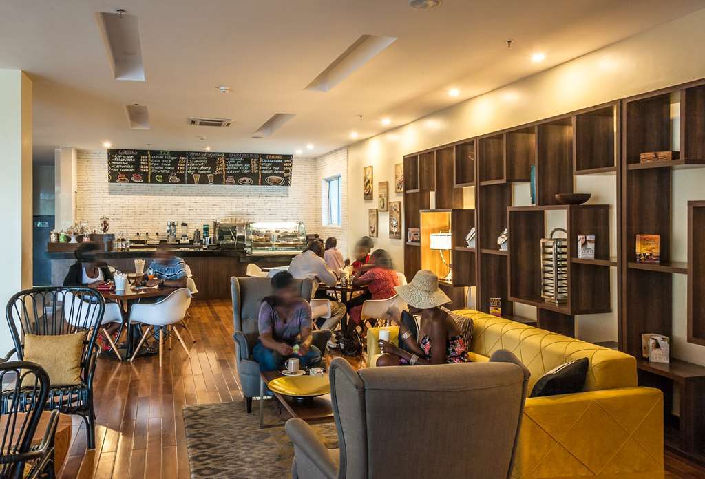 קיסומו Acacia Premier Hotel מסעדה תמונה